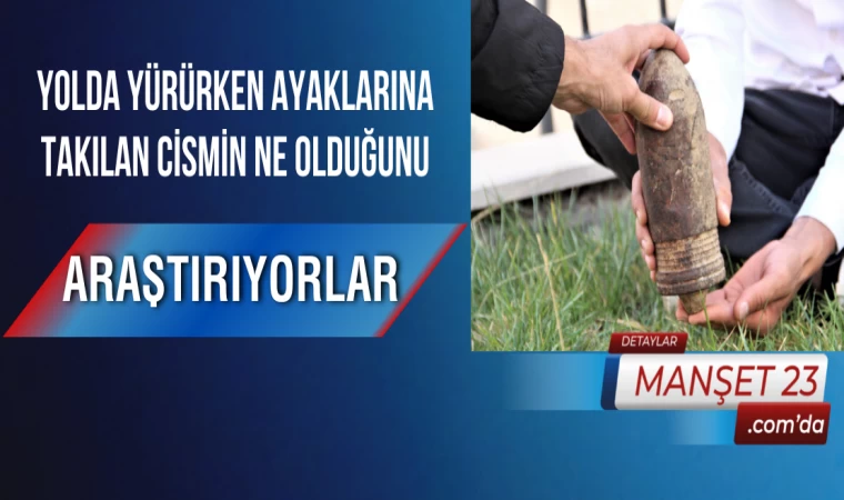 Yolda Yürürken Ayaklarına Takılan Cismin Ne olduğunu araştırıyorlar